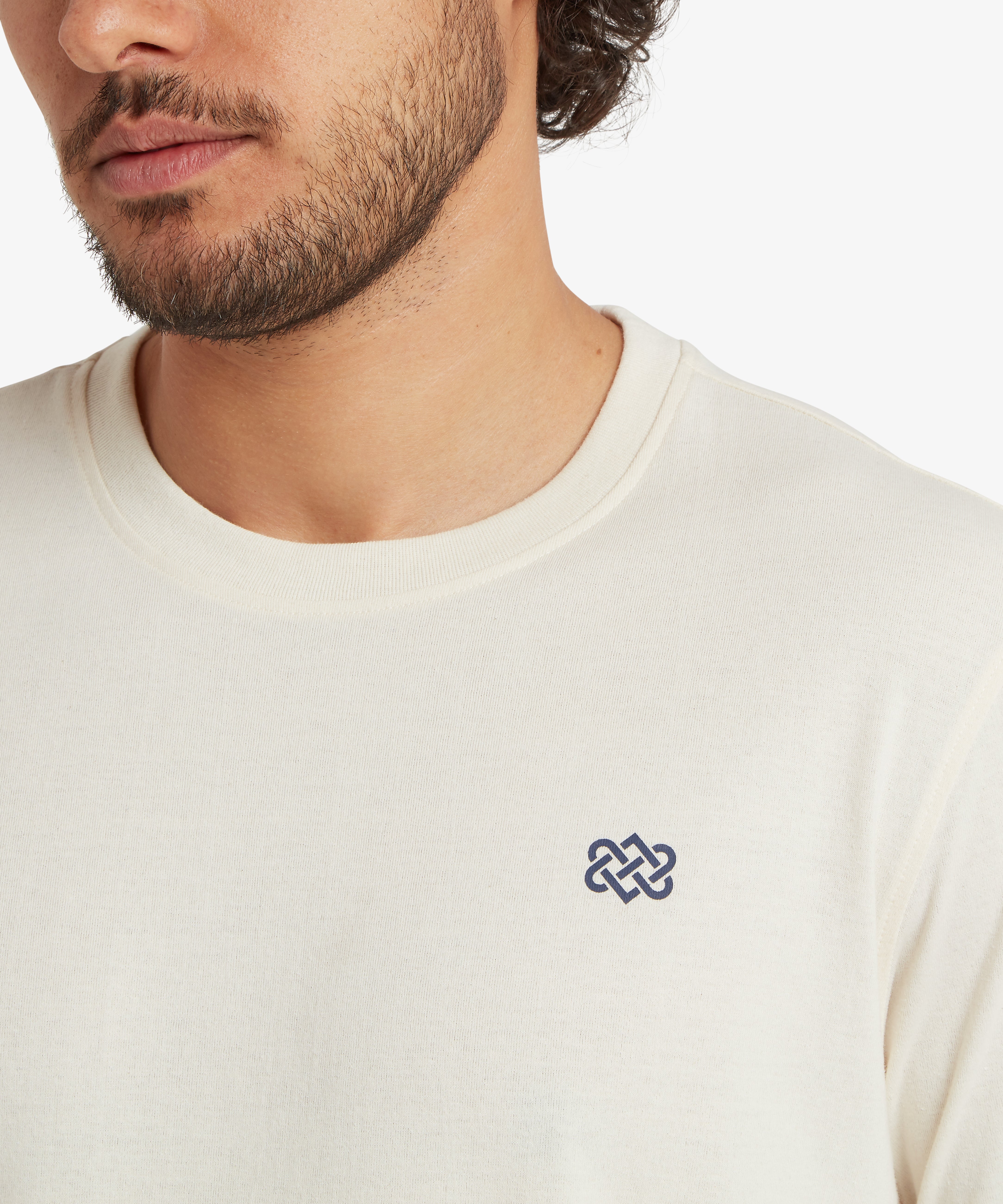 Jutnu Himalayan T-Shirt Peetho cream crewneck with navy knot embroidery