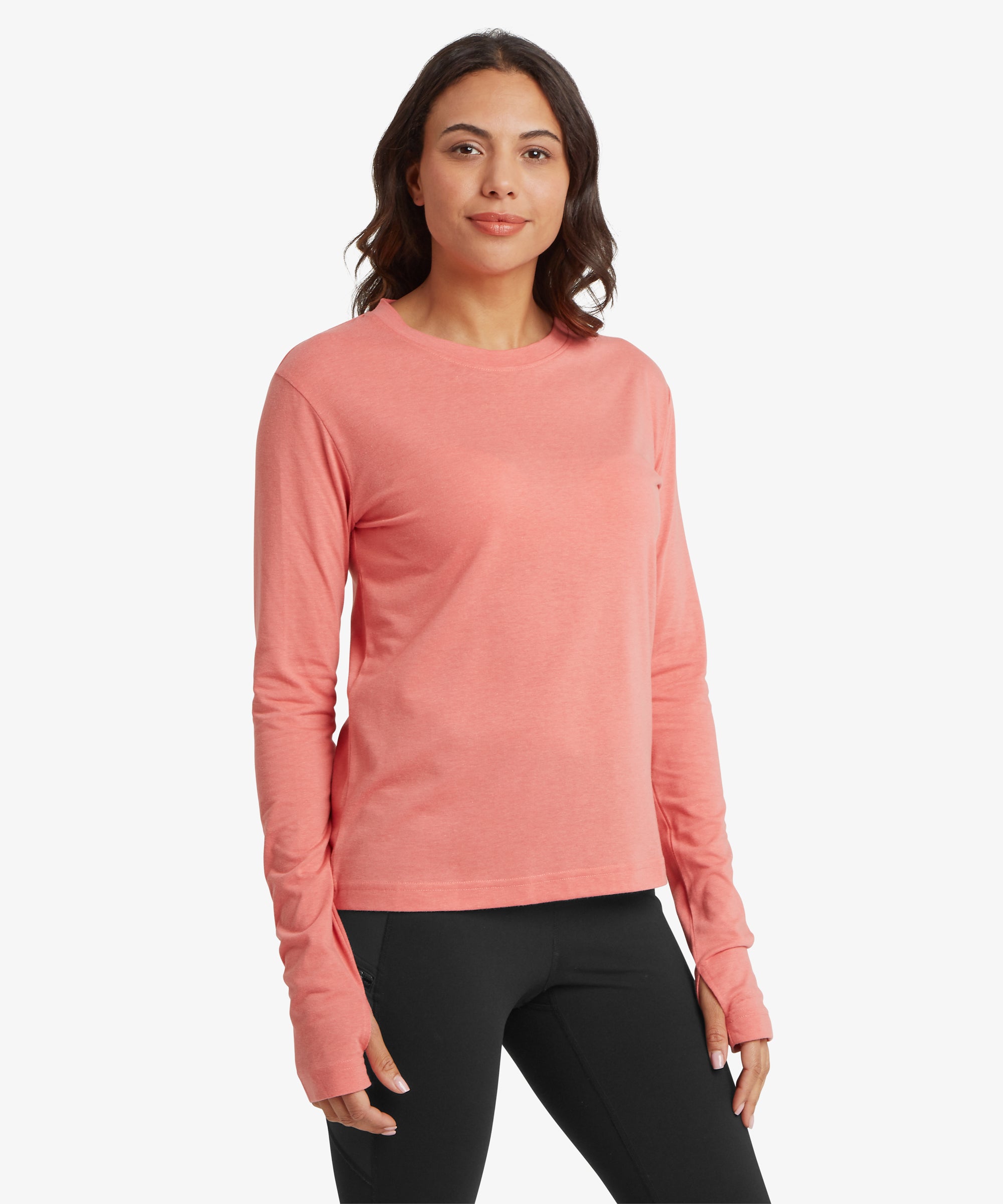 Woman wearing a pink long-sleeve shirt on a white background