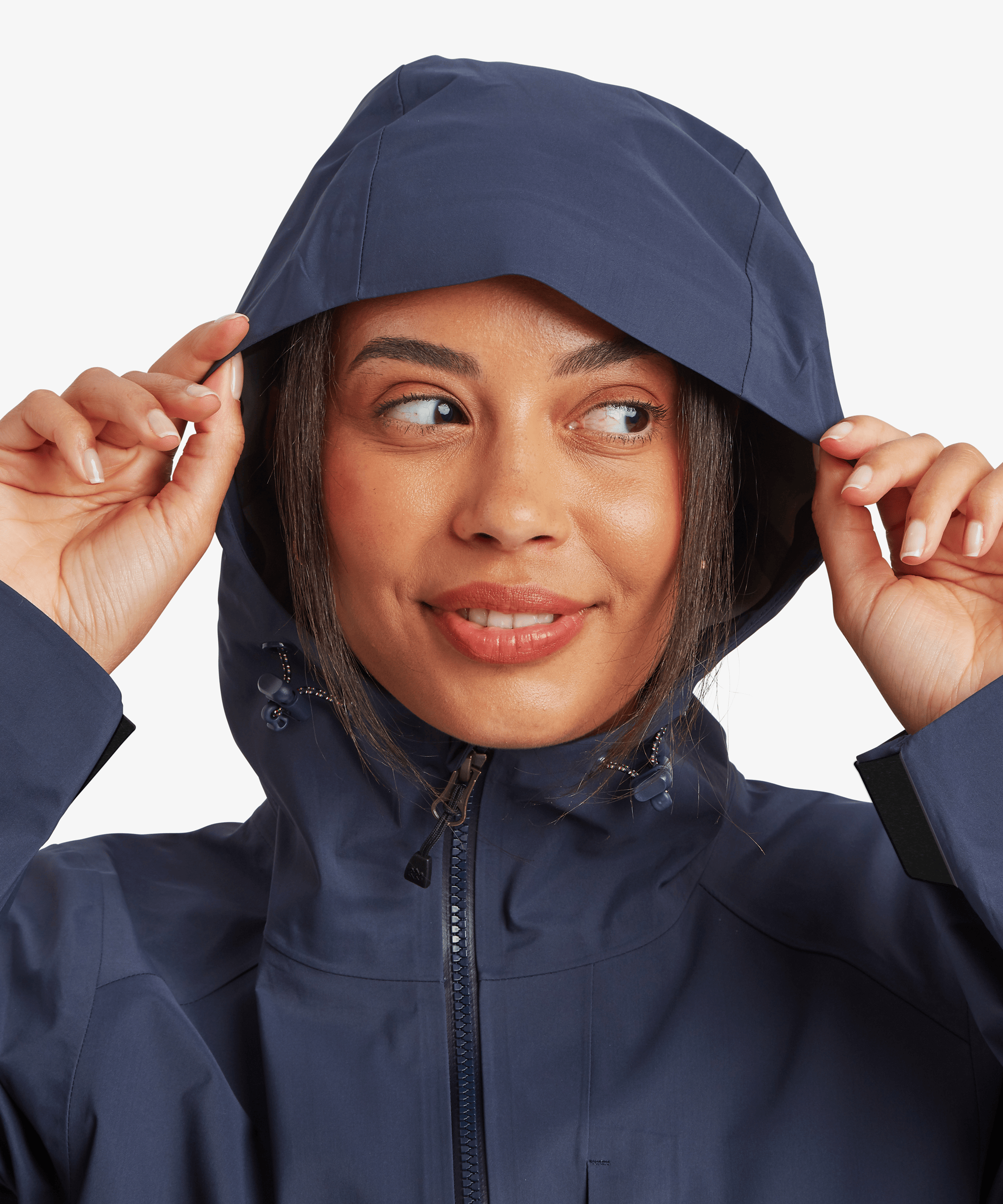 Close-up of the Women's Beyul 3-layer jacket in blue with hood up, showing the adjustable hood and high collar.