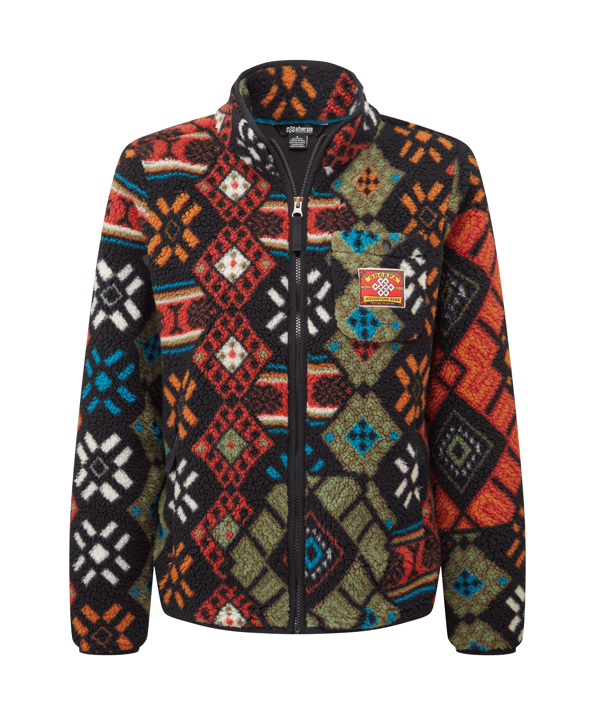 Front view of a women's Sherpa Adventure Gear printed full-zip fleece jacket in a vibrant multicolor palette. Features a stand collar, full-front zipper, and a bold geometric patchwork-inspired pattern that combines traditional influences with modern outdoor styling.