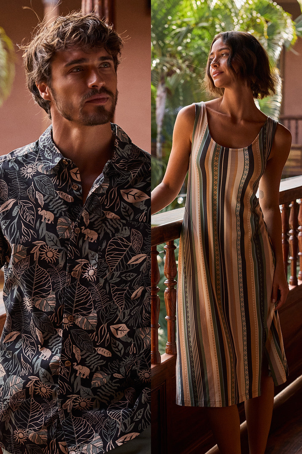 Man wearing a patterned shirt and woman in a striped dress standing on a wooden balcony. The man's shirt depicts cream and green leaves and cream elephants, whilst he woman's dress is made up of cream, green and blue stripes.