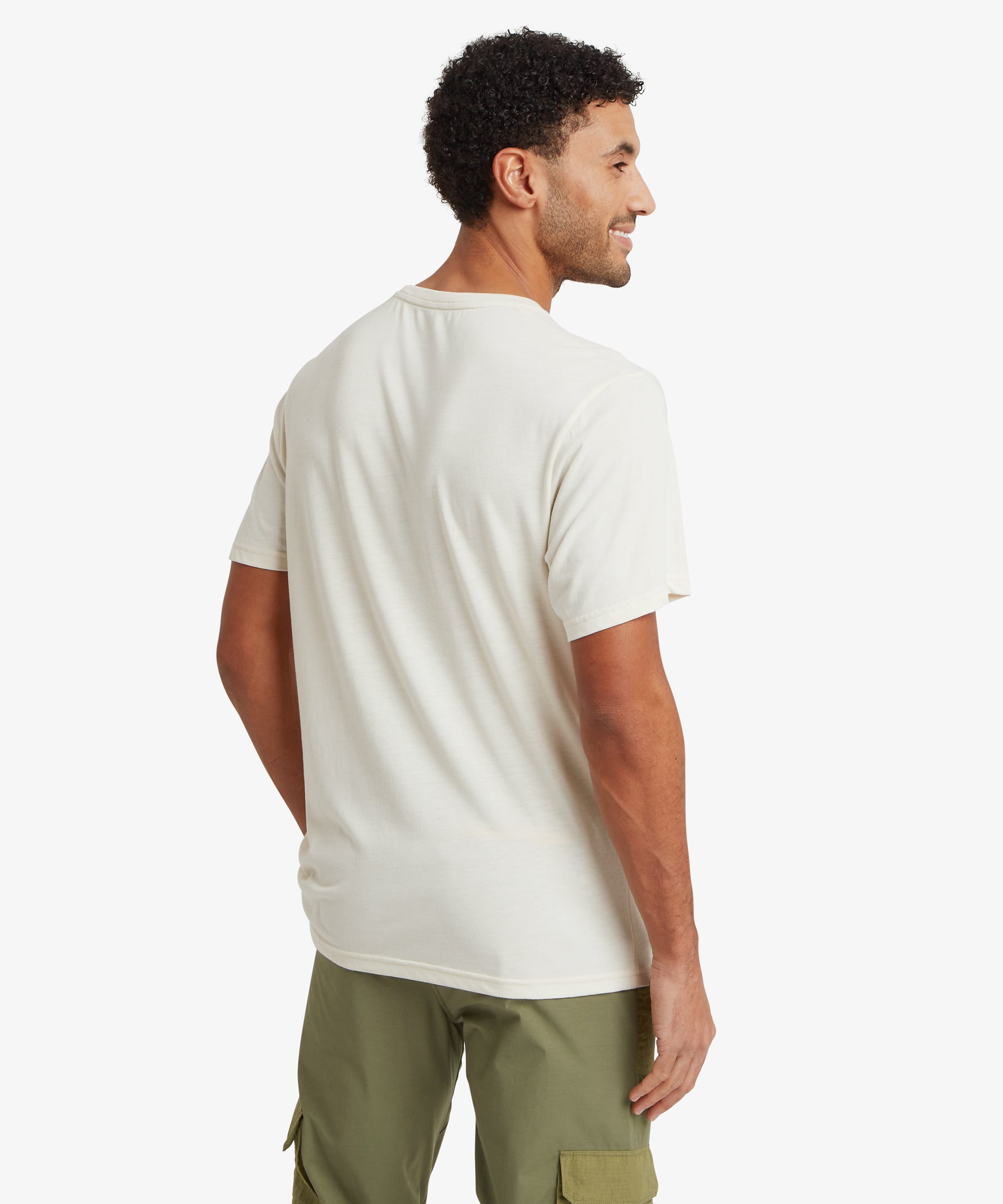 Rear view of an off‑white T‑shirt with a plain back, worn with olive green utility pants featuring cargo pockets.