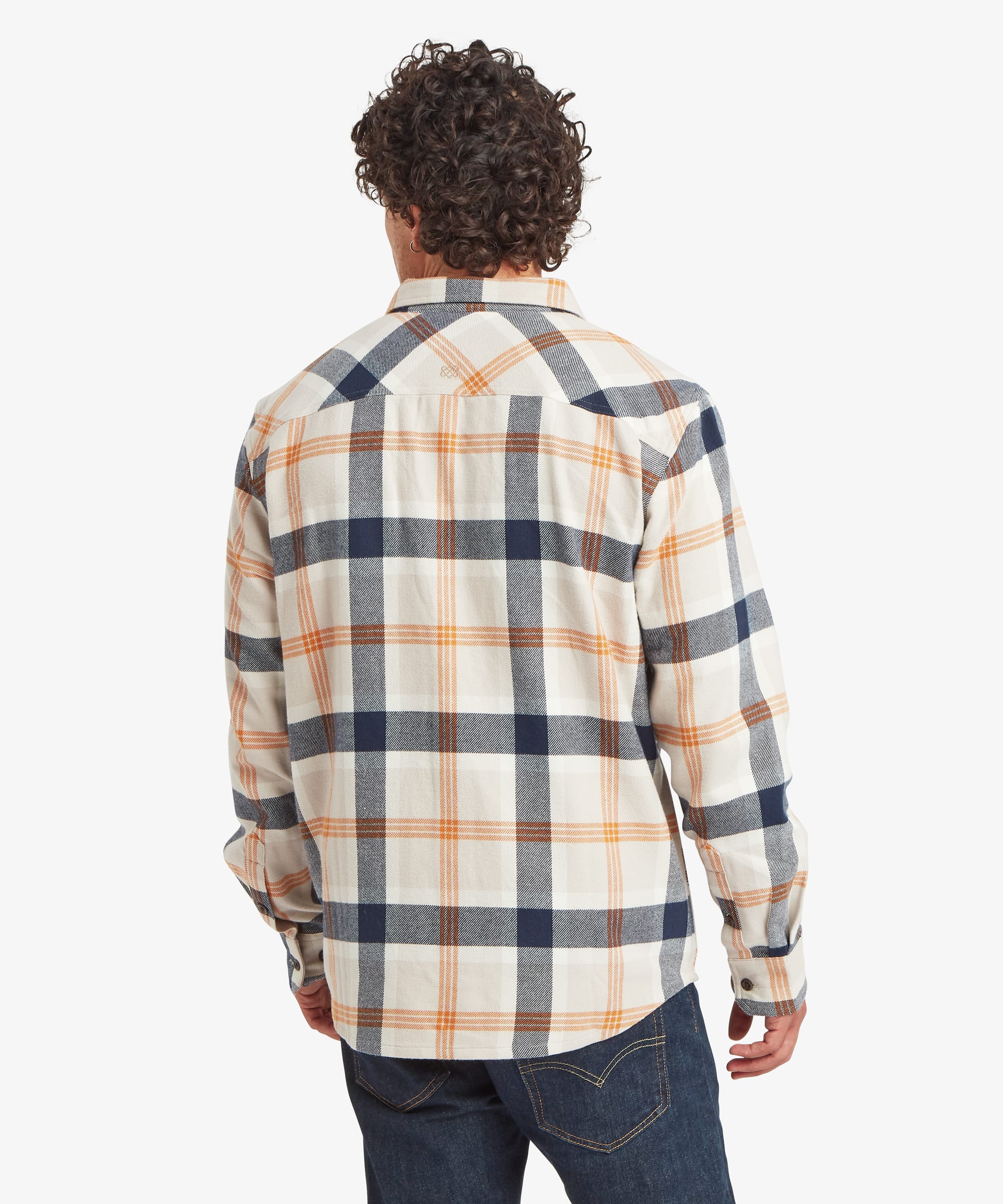 Back view of a cream plaid overshirt with navy and tan check detailing. Features include a back yoke seam, long sleeves and a relaxed fit suitable for layering.