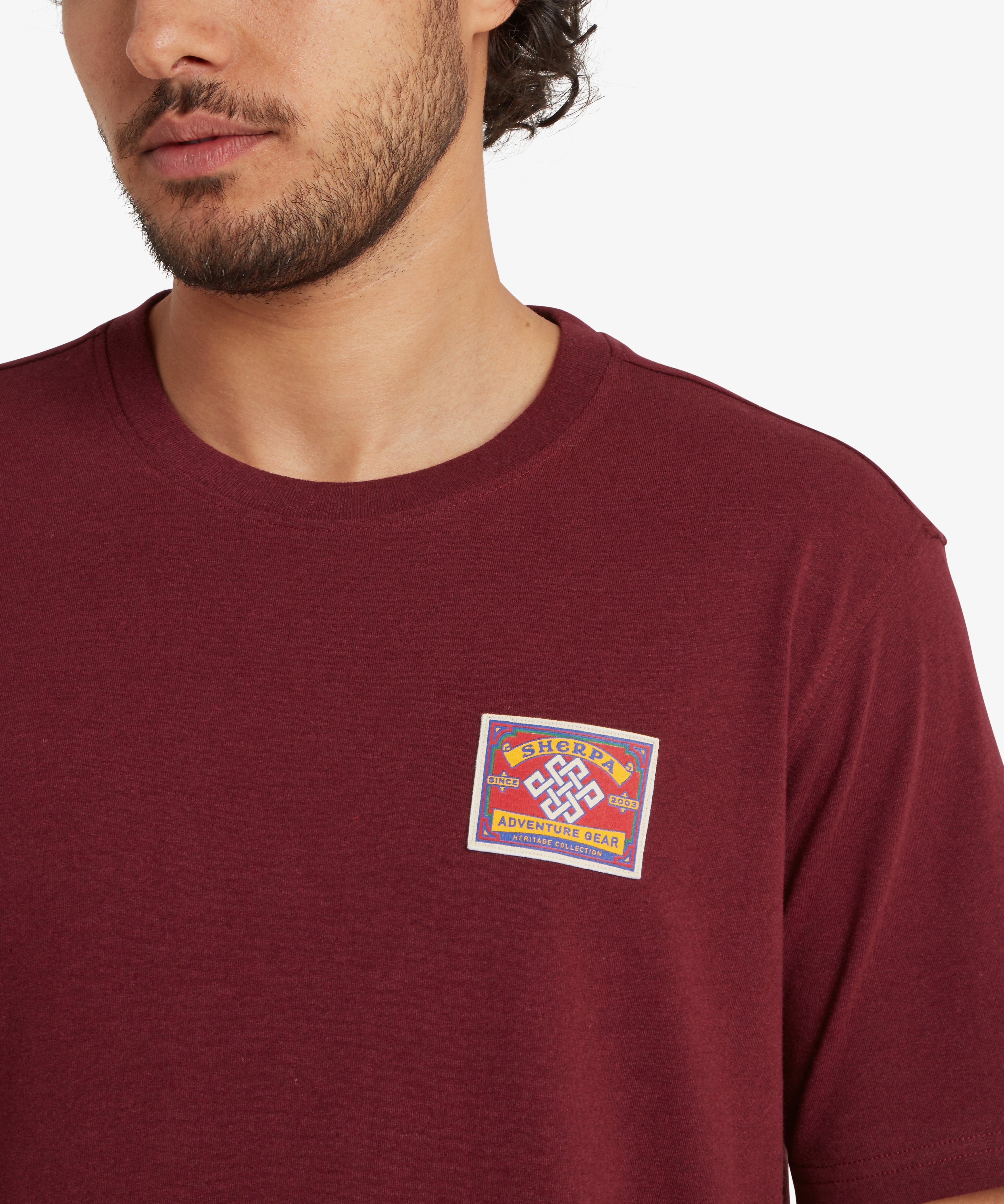 Jutnu Patch T-Shirt - Wine: maroon short-sleeve with Sherpa adventure gear patch