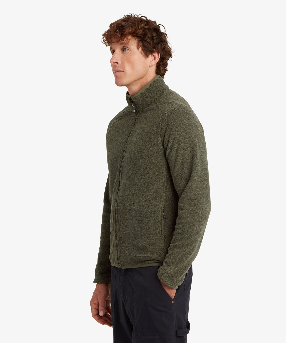 A man wearing an olive green quarter-zip fleece pullover sweater.