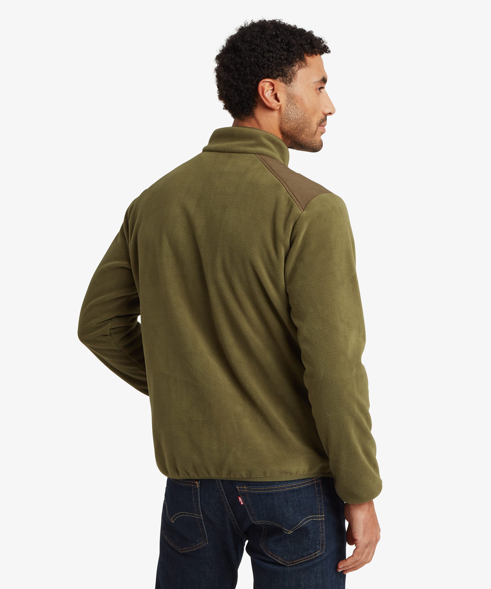 Rear three-quarter view of the olive green fleece pullover highlighting the stand collar, clean back panel, and comfortable fit through the shoulders and torso.
