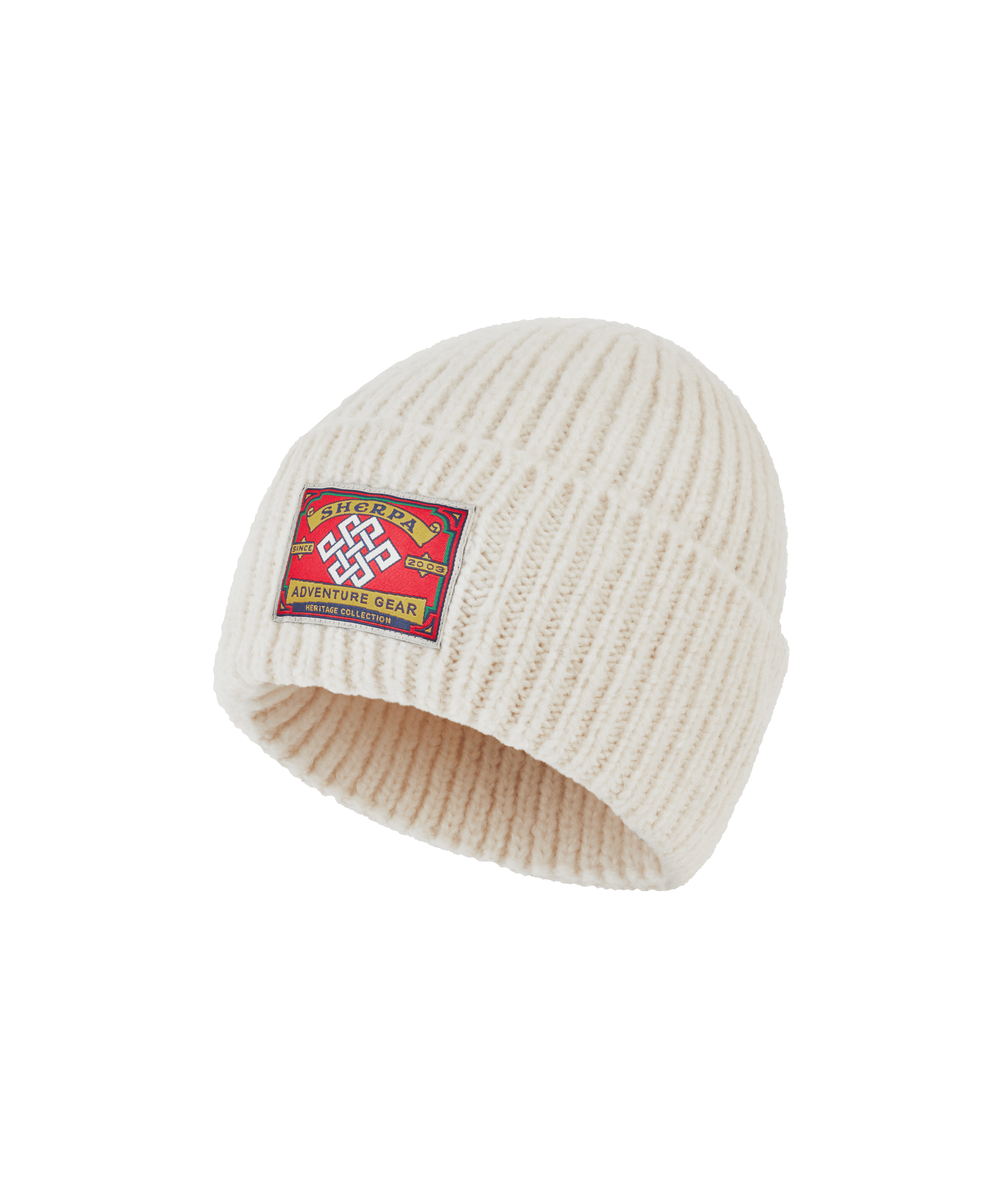 Front view of a Sherpa Adventure Gear unisex rib-knit beanie in white. Features a folded cuff, chunky knit construction, signature logo patch, and durable cold-weather styling.
