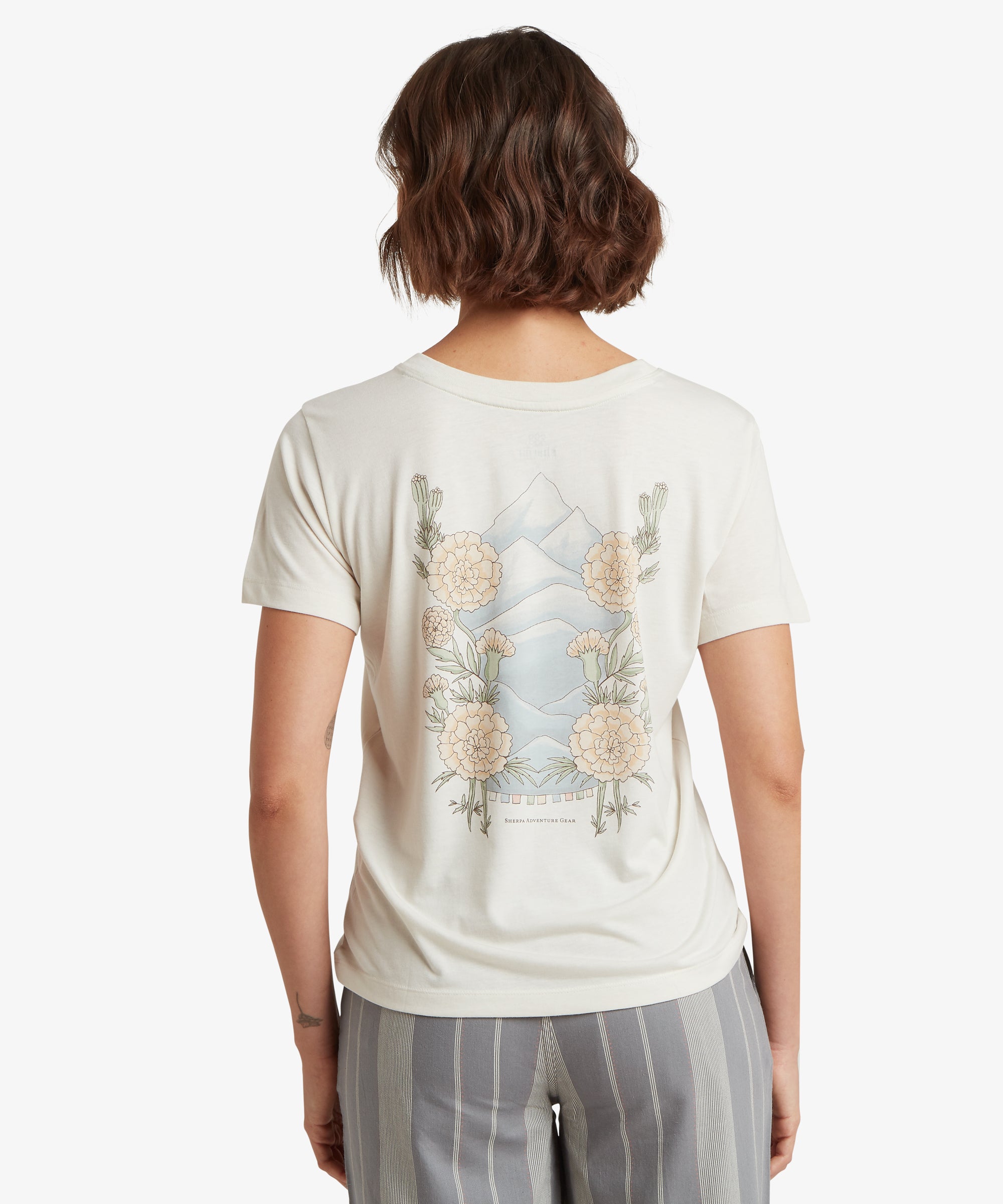 Back of Bali Mountain T-Shirt - Peetho: cream short-sleeve with floral cactus mountains