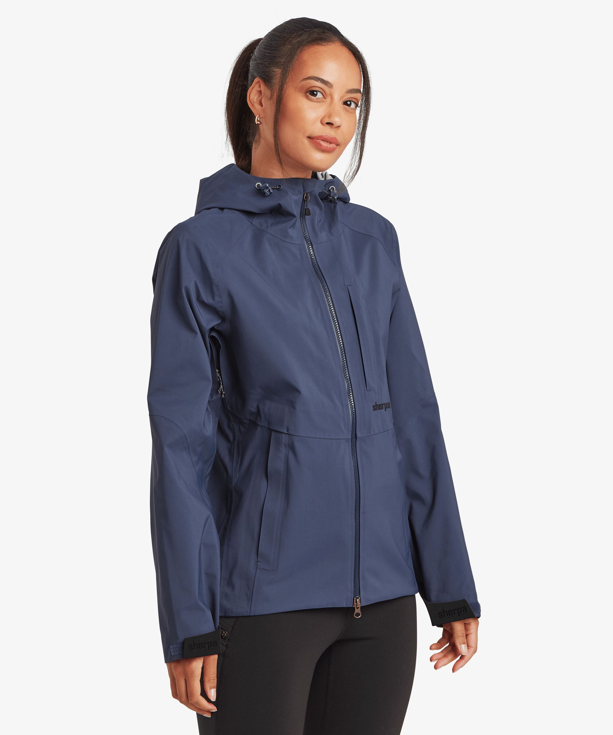 Women's Beyul 3-layer waterproof jacket in blue, shown from the front with hood down against a white studio background.
