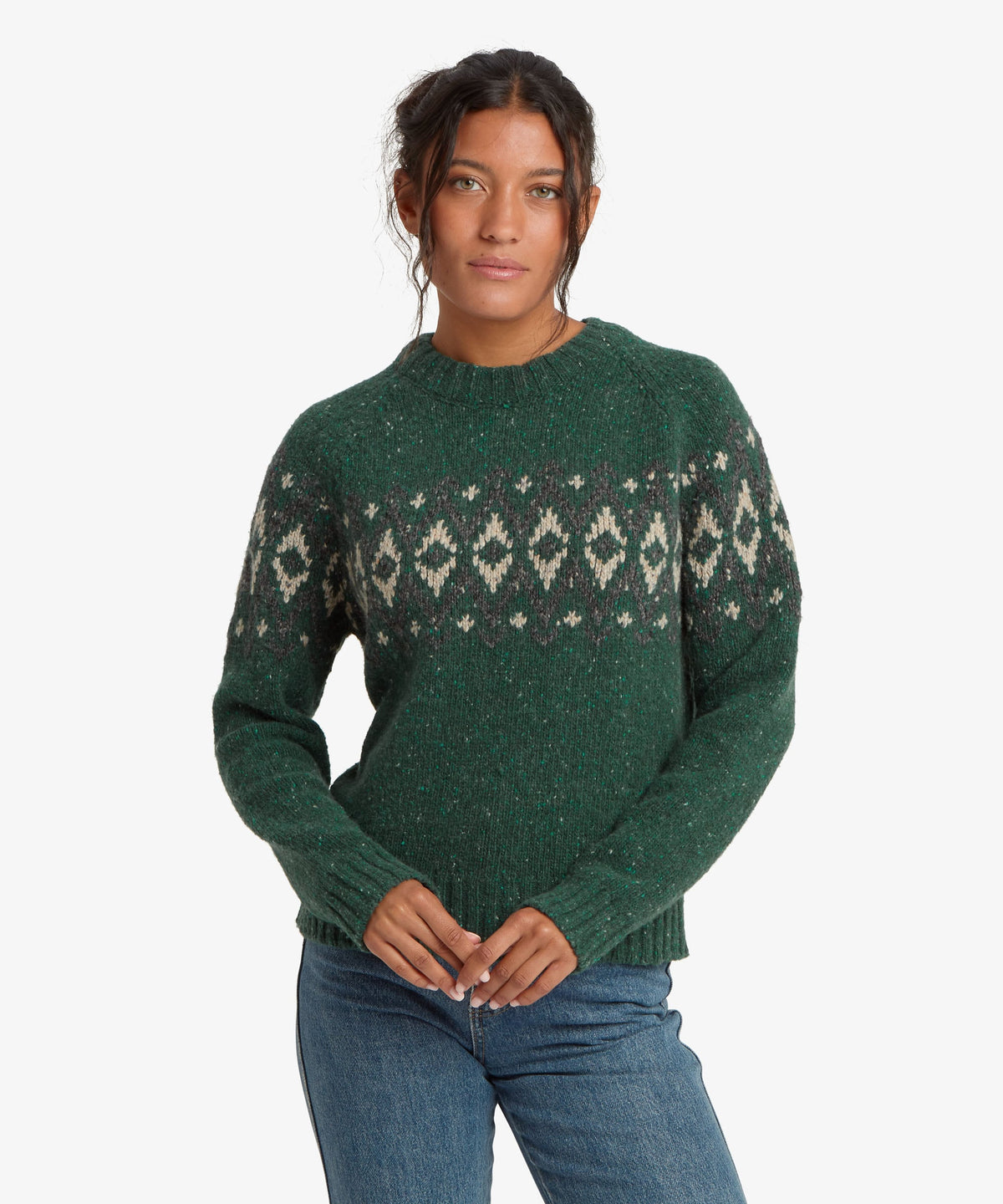 Woman wearing Sherpa Adventure Gear Dumji Sweater in green.