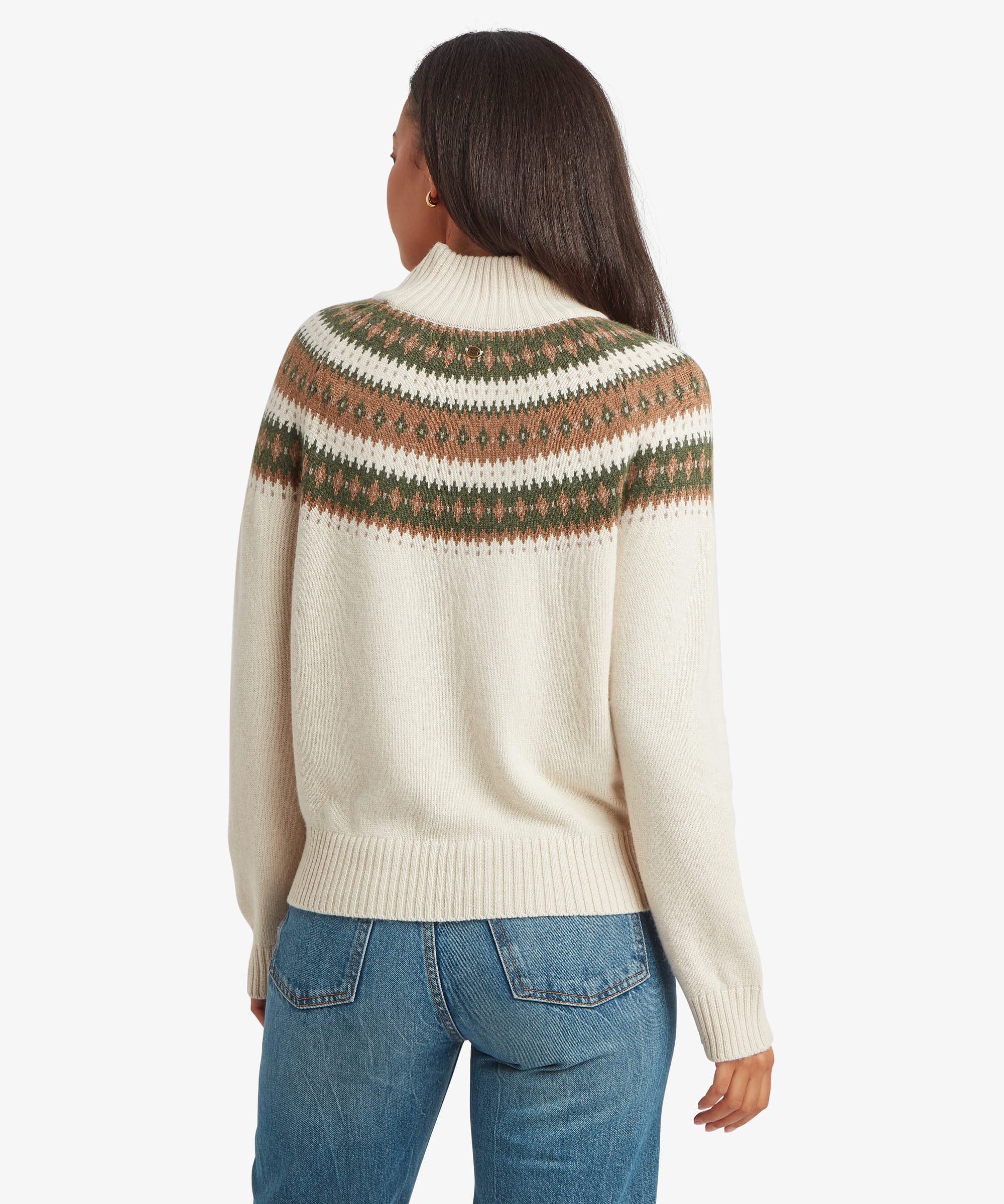 Back view of a woman wearing a cream knit mock-neck sweater with green, brown, and mustard Fair Isle patterning extending across the upper back and shoulders. Features long sleeves and a relaxed fit.