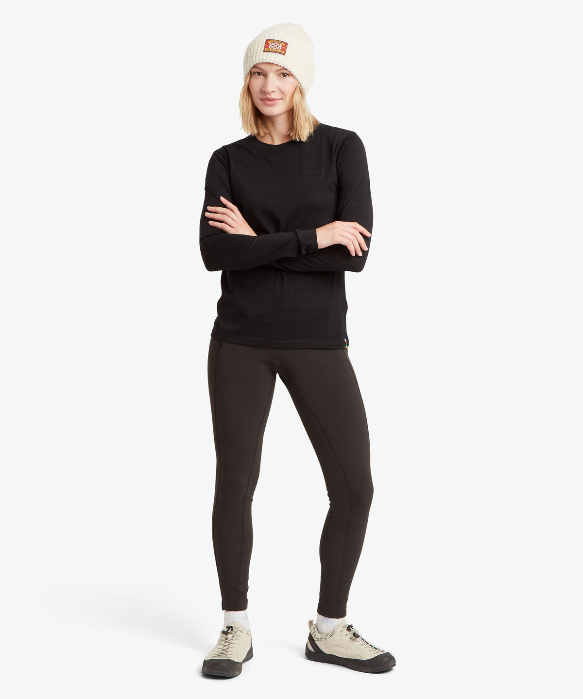 A female model wearing the Sherpa Adventure Gear womenÕs Nanda Merino Long Sleeve T-Shirt.