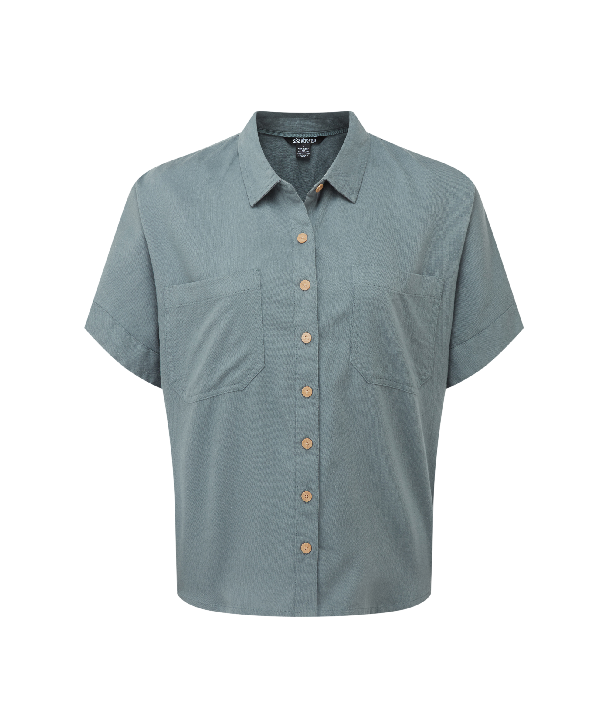 Women's light blue short-sleeve shirt with button details on a white background