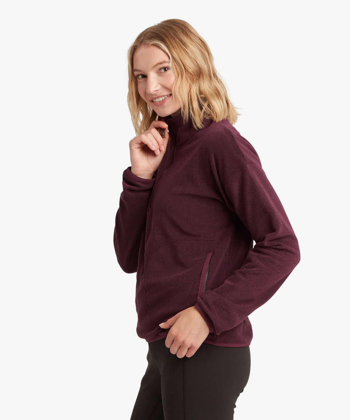 Sherpa Adventure Gear Rolpa 1/2 Zip in purple against a plain white studio background.