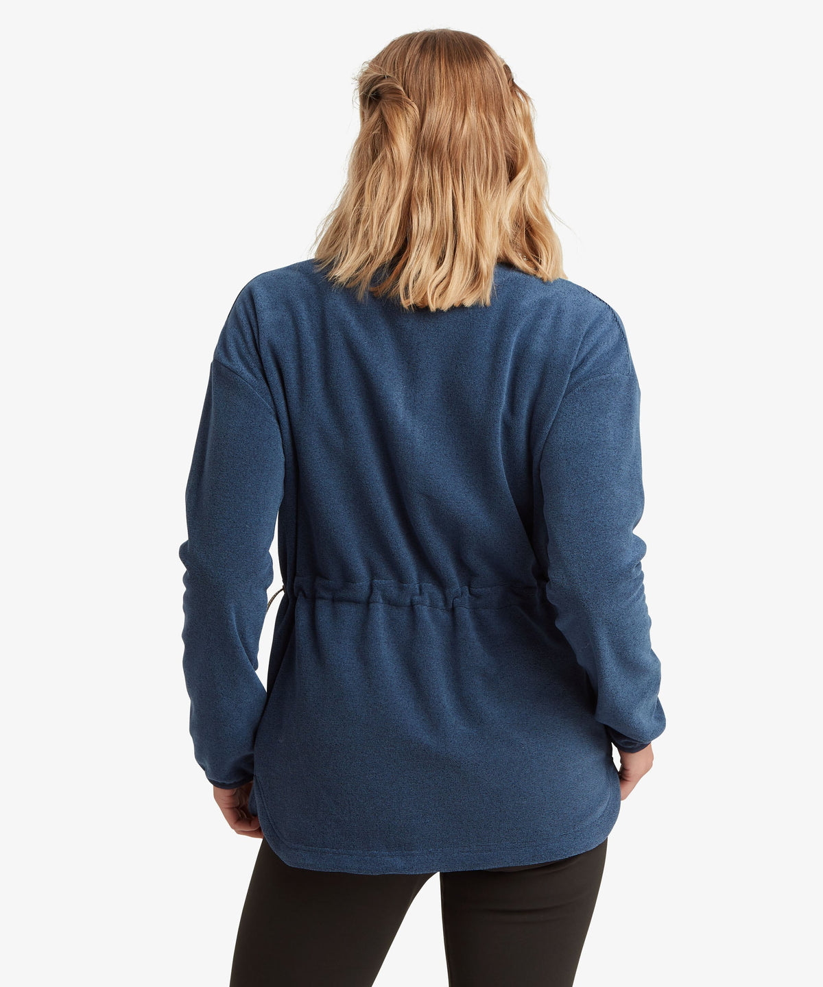A female model wearing the Sherpa Adventure Gear navy Rolpa Pop-Over fleece.