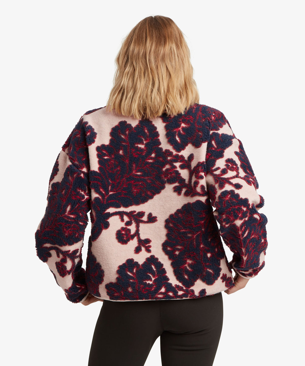 Sherpa Adventure Gear women's Tara 1/4-zip fleece in beige with a burgundy.