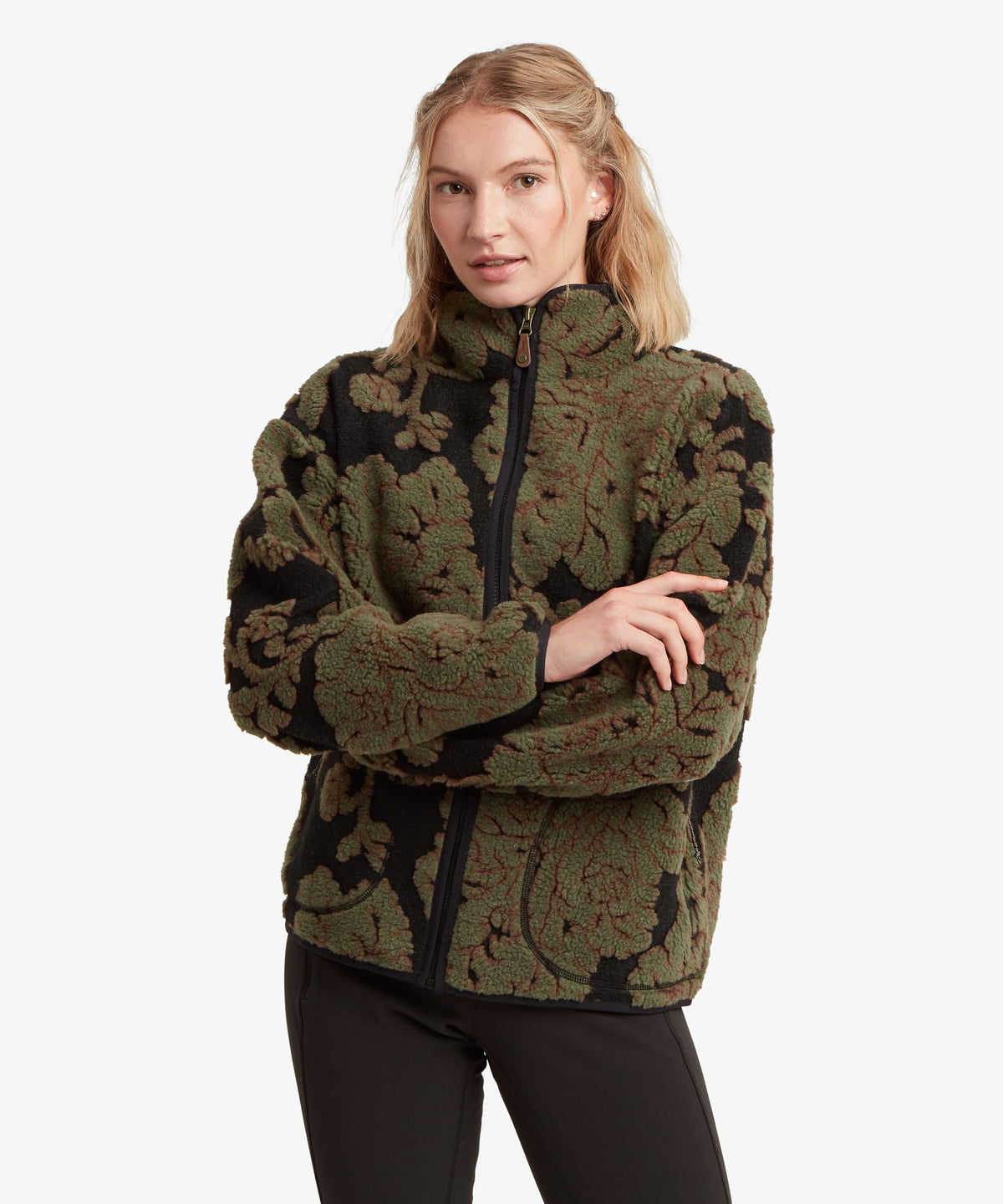 Sherpa Adventure Gear women's Tara full-zip fleece jacket in green with a dark Himalayan-inspired.