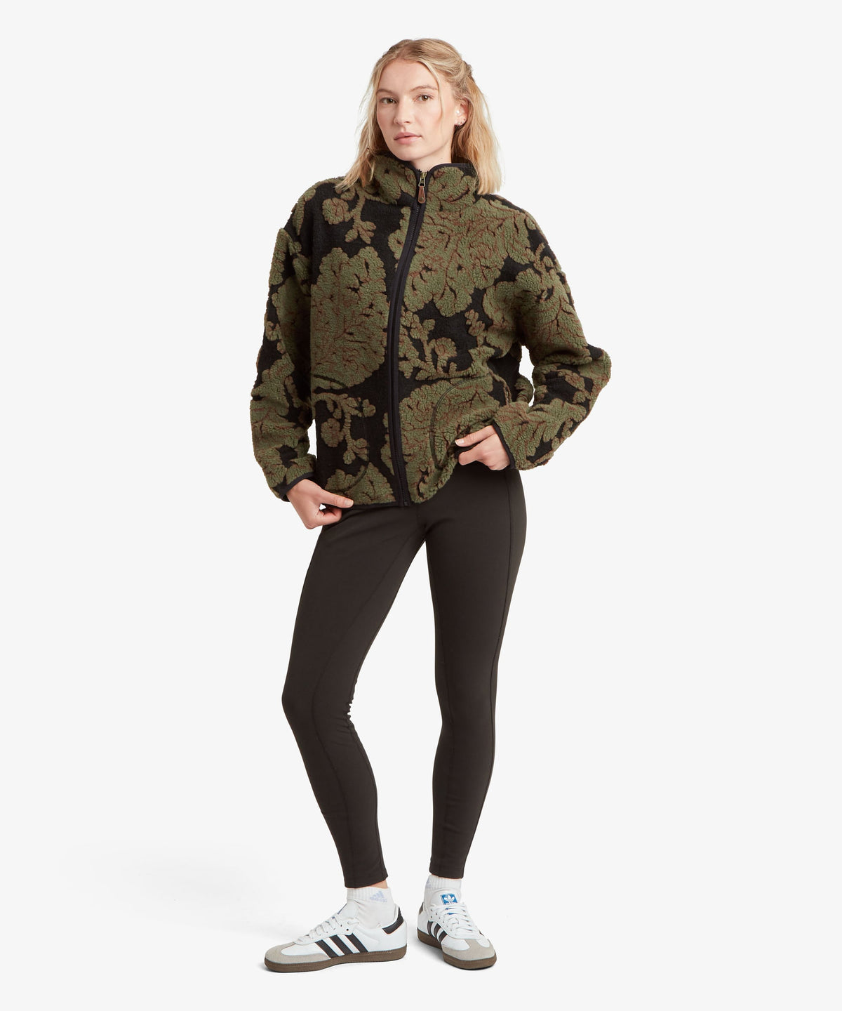 Sherpa Adventure Gear women's Tara full-zip fleece jacket in green with a dark Himalayan-inspired.