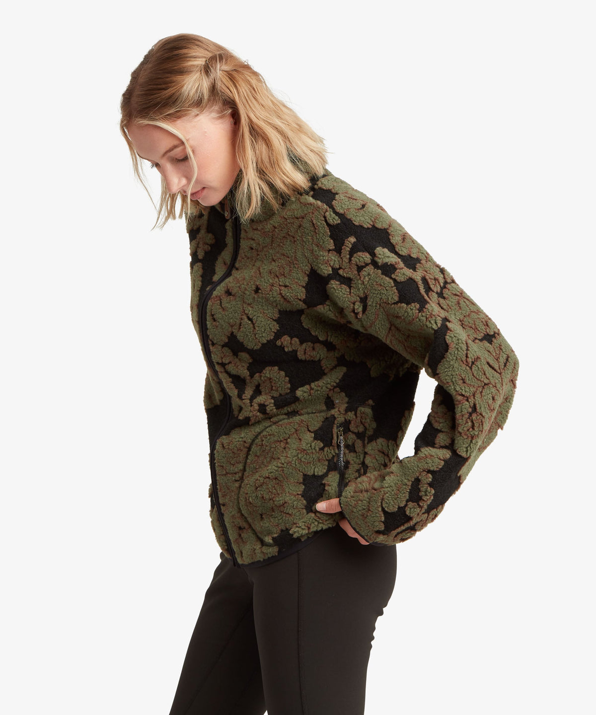 Sherpa Adventure Gear women's Tara full-zip fleece jacket in green with a dark Himalayan-inspired.