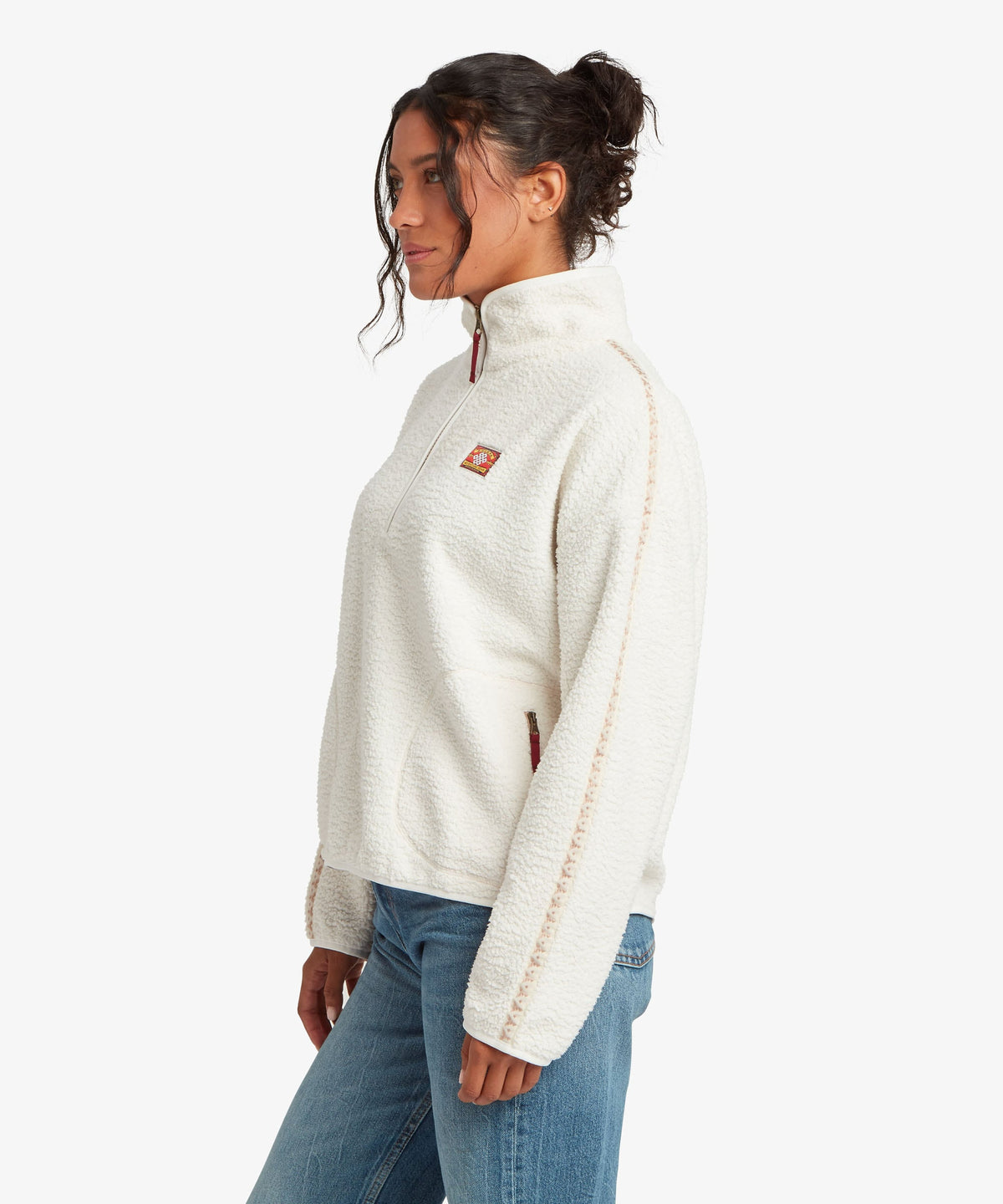 Sherpa Adventure Gear women's Tarcho 1/4-zip fleece pullover in white.