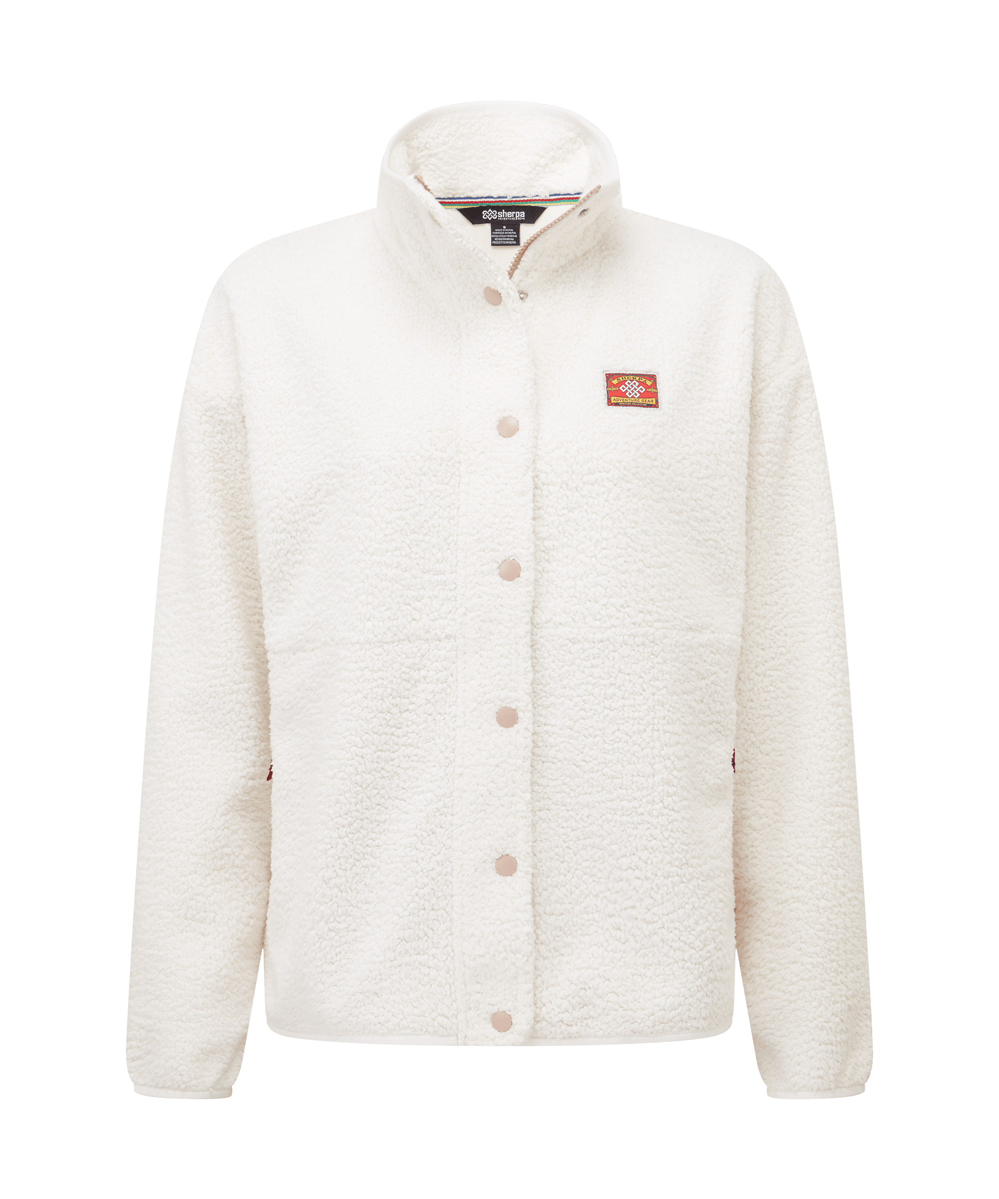 Front view of a women's Sherpa Adventure Gear full-zip fleece jacket in cream white. Features a stand collar, front closure, patch pockets, and a textured fleece fabric. Designed for comfortable layering in cool-weather conditions.